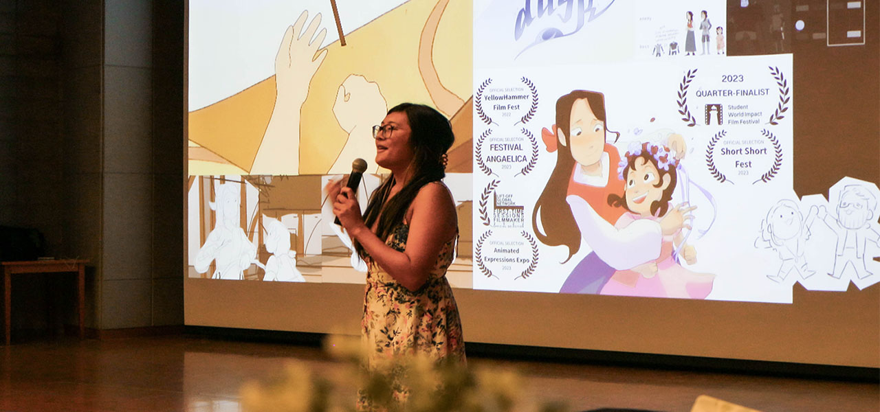 BFA Animation student Schantelle Alonzo presenting her work at the Chungkang College of Cultural Industries.